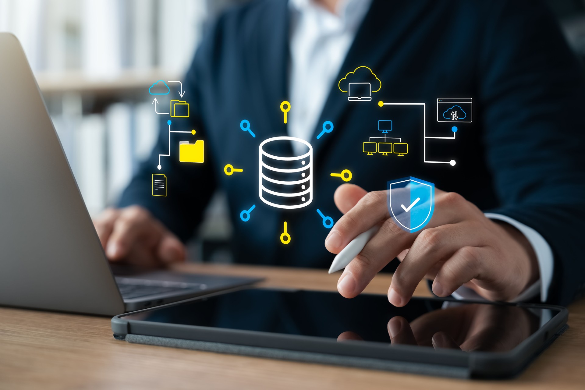 Businessman use intelligent technology cloud computing database system via laptop and tablet.